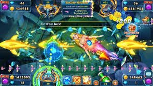 Filipino player enjoying fish game on mobile phone with colourful underwater arcade display